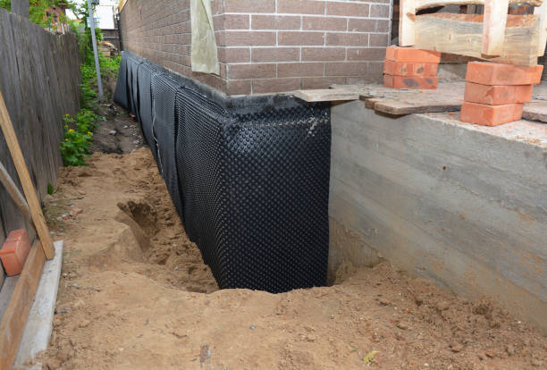 Happy homeowners after waterproofing job in Hyattsville